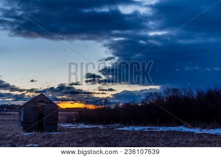 Stunning Sunrise Over A Rustic Out Building, Springbank, Alberta, Canada