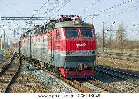Leningrad Region, Russia - April 09, 2018: Passenger Two-section Electric Locomotive Chs7-156 Close-
