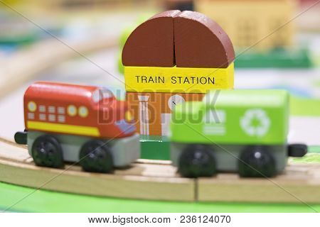 Two Train Wooden Toy With Train Station In Backdrop (selective Focused) Play Set Educational Toys Fo