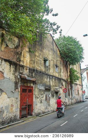 George Town, Malaysia - November 18 :   Lebuh Ah Quee Street Before Boy On A Bike Street Art In  Geo