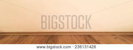 Room Wood Floor Perspective, Grunge Pastel Painted Concrete Wall And Varnished Wooden Laminate Plank