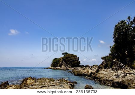 Hidden Beauty Of Kapas Island Located In Terenganu, Malaysia At Sunny Day. Blue Sky And Clear Sea Wa
