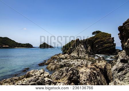 Hidden Beauty Of Kapas Island Located In Terenganu, Malaysia At Sunny Day. Blue Sky And Clear Sea Wa