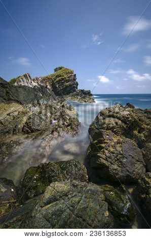 Hidden Beauty Of Kapas Island Located In Terenganu, Malaysia At Sunny Day. Blue Sky And Clear Sea Wa