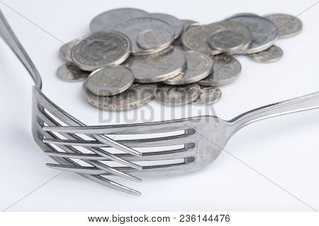 Conceptual Representation Of Financial Greed By Two Forks And Coins