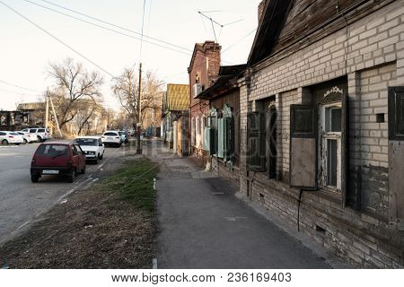 Astrakhan, Russia 12 Of April 2018: In The Street Of Astrakhan In Sunny Spring Day With Expensive Ca