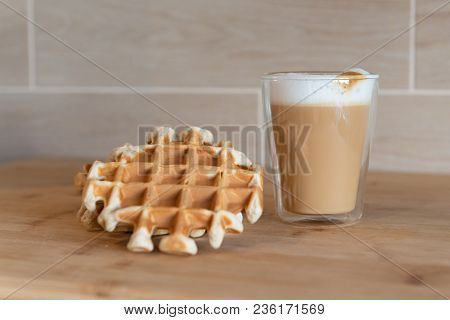 Glass Cups Of Multilayer Coffee With Mini Stroopwafel, Syrupwaffles Cookies On Light Gray Background