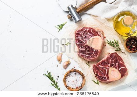 Raw Beef Steak Osso Bucco. Marble Meat. Top View With Copy Space On White Table.
