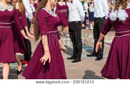 Elegant Graduates Are Dancing Waltz