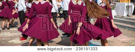 Elegant Graduates Are Dancing Waltz