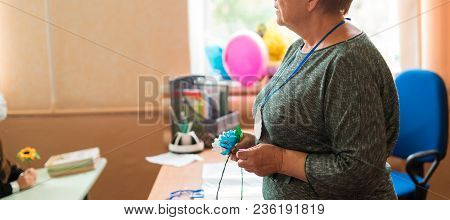 Not A Young Teacher Holds The First Lesson, Again To School, A Holiday, The Beginning Of The School