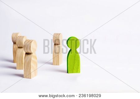 A Man Stands In The Crowd And Looks The Other Way On A White Background. Concept Meeting Rally. Anot