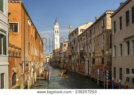 Canal In Venice Leading To The Saint George Of The Greeks (san Giorgio Dei Greci) Chuch With Its Cha