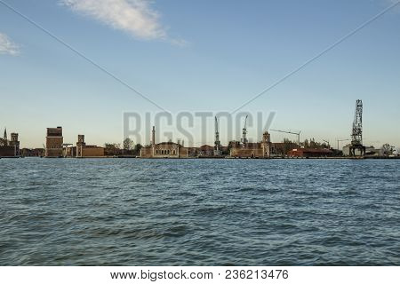 Industrial Area Costruzioni Arsenale Di Venezia In Venice With Cranes And Buildings