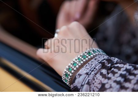 Beautiful Woman With Yellow Sport Car. Young Female Model With Lixury Diamonds Jewerly Sitting In A 