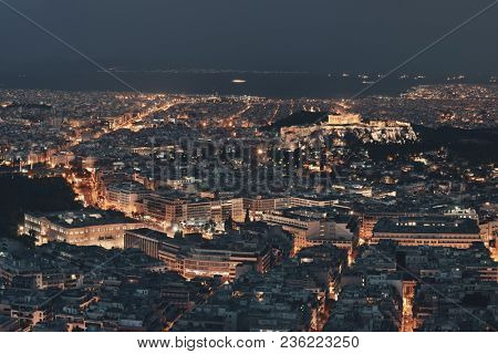 Athens skyline at night viewed from Mt Lykavitos with Acropolis, Greece.