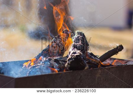Fire In The Grill For Cooking Meat.