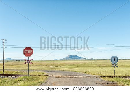 A Level Railway Road Crossing At Tweespruit, A Small Town In The Free State Province Of South Africa