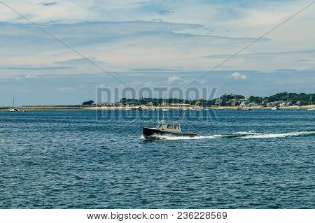 Fishing Boat And Beautiful Landscape Of Ocean Beach Cape Cod Massachusetts Us