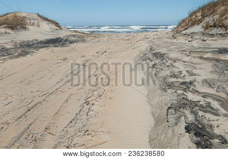 Off Road Beach Access:  A Clearing For Recreational Vehicles Passes Between Sand Dunes And Opens To 