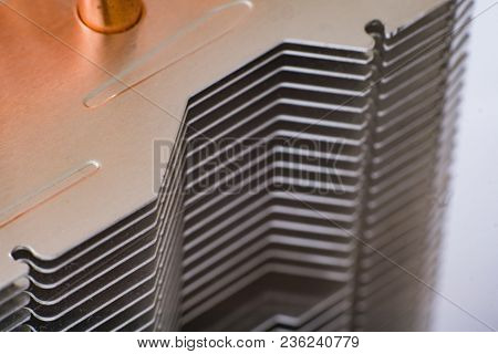 Aluminum Radiator With Copper Heat Pipe Close-up With Beautiful Bokeh Metallic Background