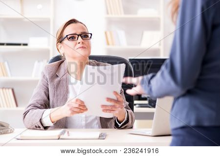 Angry boss dismissing employee for bad underperformance