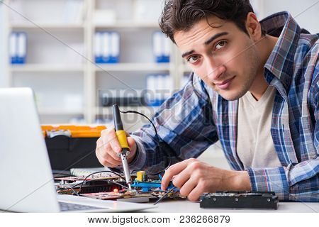 Computer hardware repair and fixing concept by experienced techn
