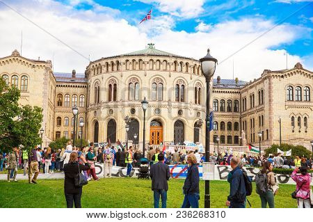 Oslo, Norway-august 13, 2014 -solidarity Activists Hold A Banner Reading 