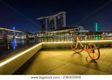Marina Bay, Singapore - April 1 2018 : A  Bicycle Operated By Obike Are Parking With View Of Marina 