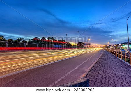1 Dec 2017 Taman Perlin, Johor Bahru, Malaysia :light Trails At Blue Hour On Road Of Traffic Lights 