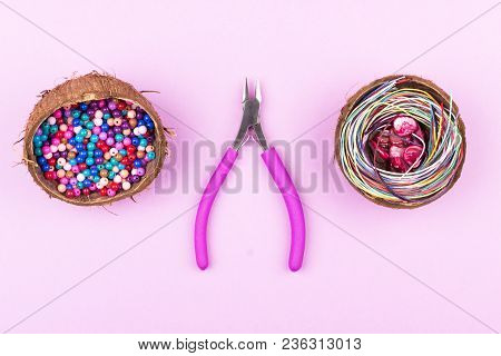 Hobby, Handmade, Fine Arts. Creative Craft Concept With Mix Of Colored Beads In Halves Of Coconut, C