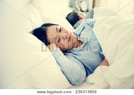Couple on bed having an arguement