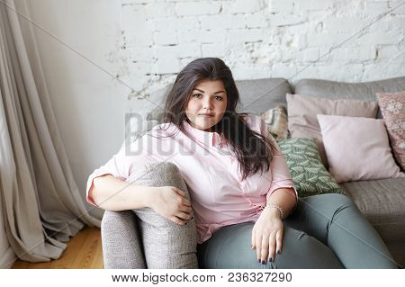 Beauty, People And Body Positivity Concept. Horizontal Shot Of Beautiful Young Brunette Caucasian Fe