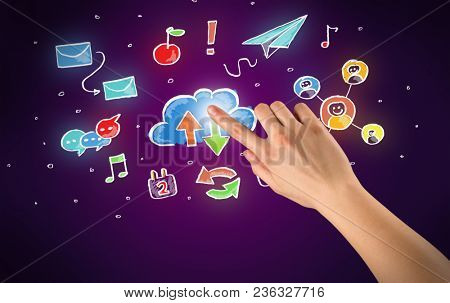 Female hand toucing mixed media icons with purple background