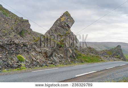 Rocky Cliffs On The Coast Of The Barents Sea Along The Varanger