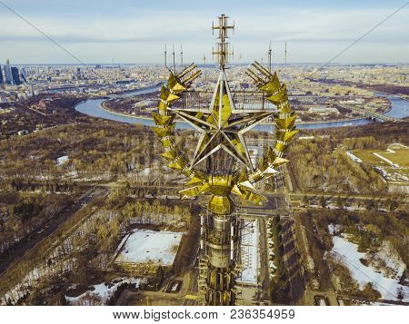 Aerial Close Up Shot Of Spire With Star On The Tall Empire Style Building
