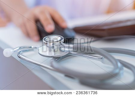 Healthcare And Medical Concept, Doctor's Working Seaching Information About Patient Database Through