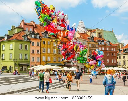 Warsaw, Poland - June 29, 2013: Colorful Balloons Against The Background Of Ancient Buildings. Marke