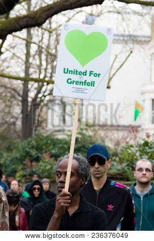 London, United Kingdom, 14th April 2018:- Marchers On A Silent March From Kensington Town Hall To Th