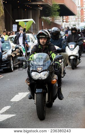London, United Kingdom, 14th April 2018:- Bikers Leading A Silent March From Kensington Town Hall To