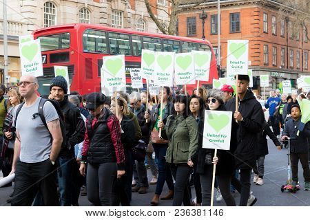 London, United Kingdom, 14th April 2018:- Marchers On A Silent March From Kensington Town Hall To Th