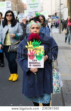 London, United Kingdom, 14th April 2018:- Marchers On A Silent March From Kensington Town Hall To Th
