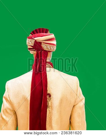 Male Mannequin Dressed In Sherwani Turban Bridal Indian Ethnic Wear. View From Behind