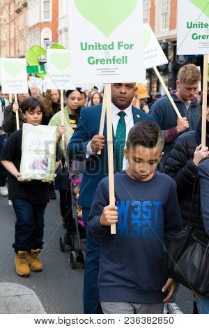 London, United Kingdom, 14th April 2018:- Marchers On A Silent March From Kensington Town Hall To Th