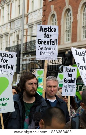 London, United Kingdom, 14th April 2018:- Marchers On A Silent March From Kensington Town Hall To Th