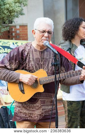 London, United Kingdom, 14th April 2018:- Performers Before A Silent March From Kensington Town Hall