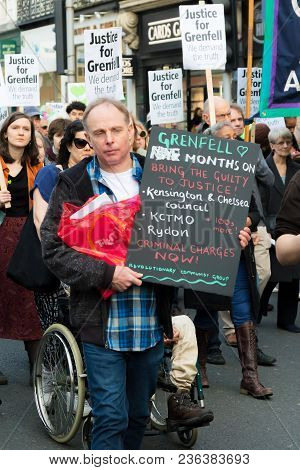London, United Kingdom, 14th April 2018:- Marchers On A Silent March From Kensington Town Hall To Th