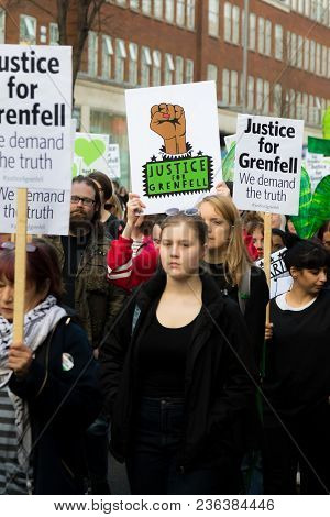 London, United Kingdom, 14th April 2018:- Marchers On A Silent March From Kensington Town Hall To Th
