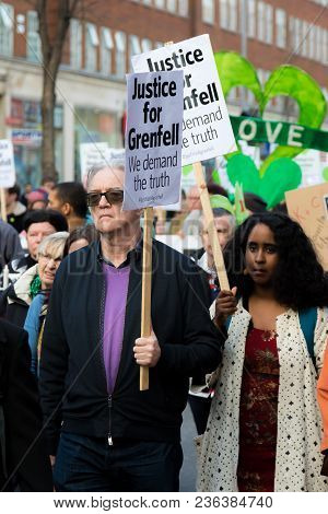 London, United Kingdom, 14th April 2018:- Marchers On A Silent March From Kensington Town Hall To Th