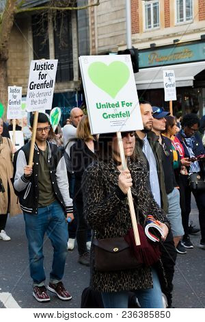 London, United Kingdom, 14th April 2018:- Marchers On A Silent March From Kensington Town Hall To Th